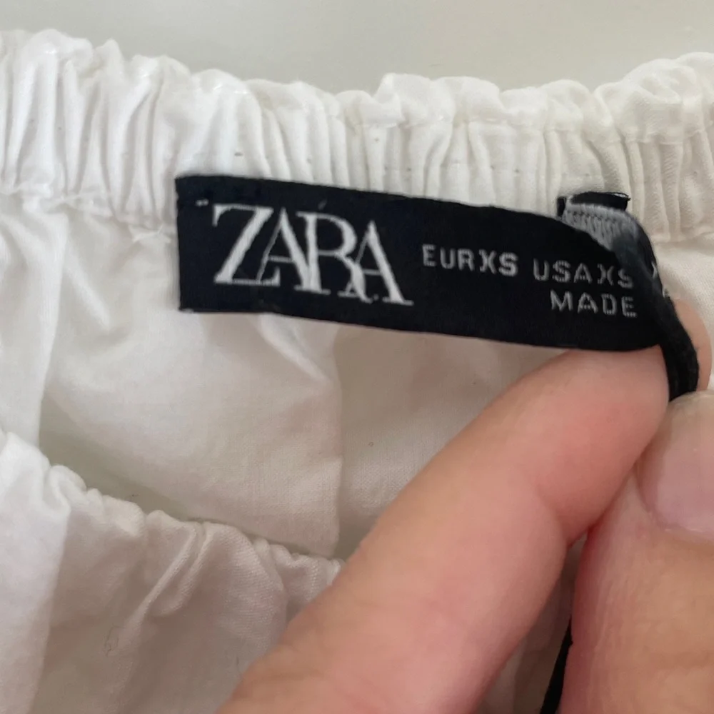 Zara White Eyelet Ruffle Peasant Top
